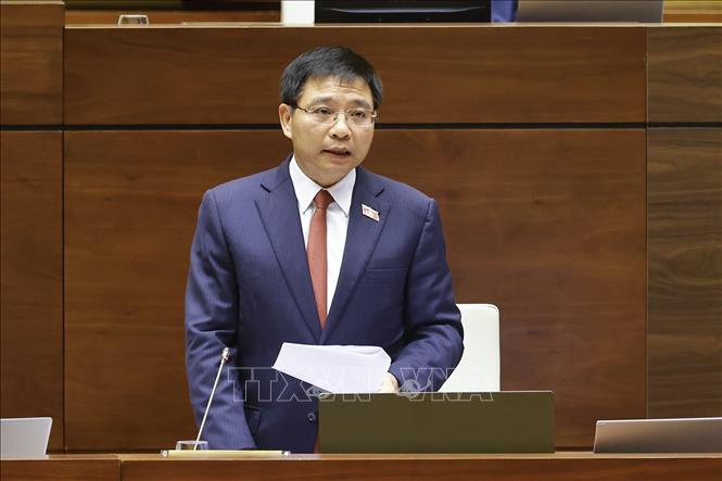 Bộ trưởng Bộ Tài chính Nguyễn Văn Thắng giải trình, làm rõ một số vấn đề đại biểu Quốc hội nêu. Ảnh: Doãn Tấn - TTXVN