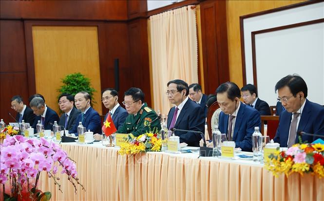 Prime Minister Pham Minh Chinh and the Vietnamese delegation at the talks. VNA Photo: Dương Giang
