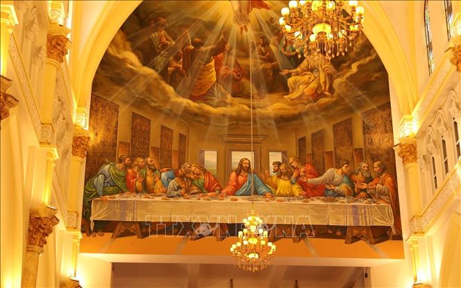 A large mural inside the church. VNA Photo: Đức Phương