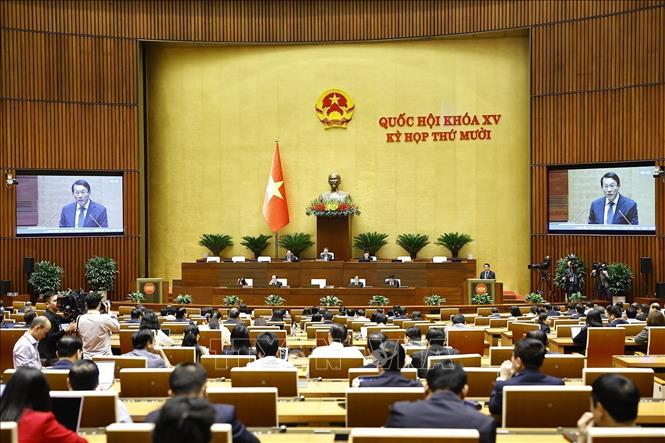 Bộ trưởng Bộ Công an Lương Tam Quang, thừa ủy quyền của Thủ tướng Chính phủ trình bày Báo cáo công tác phòng, chống tội phạm và vi phạm pháp luật năm 2025. Ảnh: Doãn Tấn - TTXVN