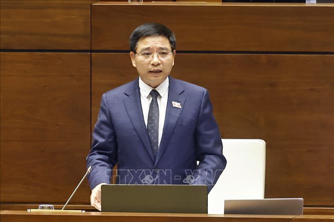Bộ trưởng Bộ Tài chính Nguyễn Văn Thắng giải trình, làm rõ một số vấn đề đại biểu Quốc hội nêu. Ảnh: Doãn Tấn - TTXVN