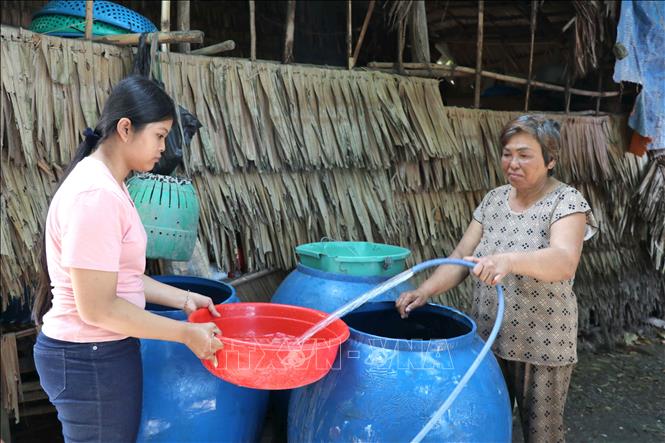 Locals in Sa Binh hamlet get access to clean water. VNA Photo: Thanh Hòa