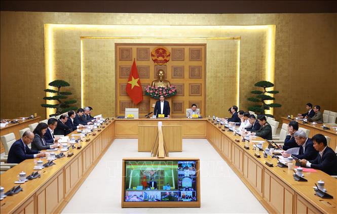 PM Pham Minh Chinh chairs the meeting. VNA Photo: Dương Giang