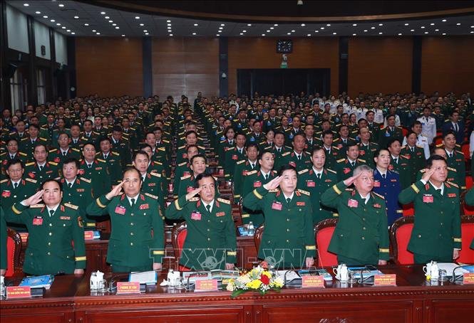 Các đại biểu dự đại hội thự hiện nghi lễ chào cờ. Ảnh: Trọng Đức - TTXVN