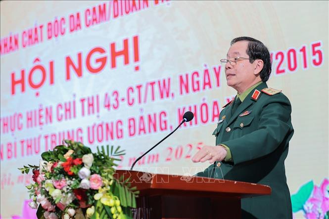 Trung tướng Nguyễn Hữu Chính, Chủ tịch Hội Nạn nhân chất độc da cam/dioxin Việt Nam phát biểu khai mạc Hội nghị. Ảnh: Lê Đông - TTXVN