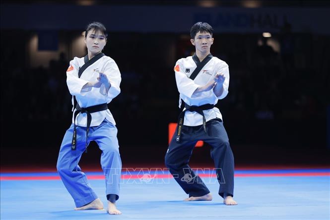 Đội Việt Nam thi đấu bán kết nội dung Quyền tiêu chuẩn gặp chủ nhà Thái Lan. Ảnh: Minh Quyết - PV TTXVN tại Thái Lan