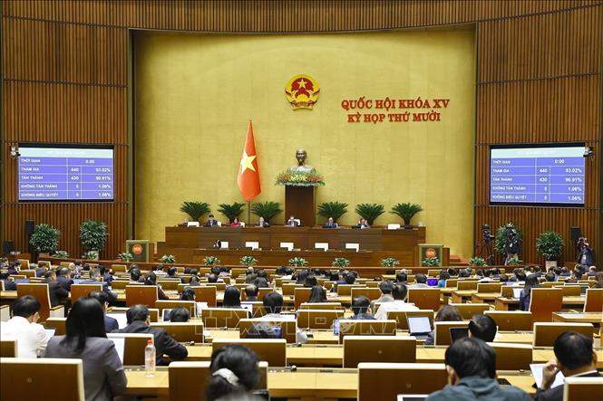 NA deputies pass key laws and resolutions. VNA Photo: Doãn Tấn 
