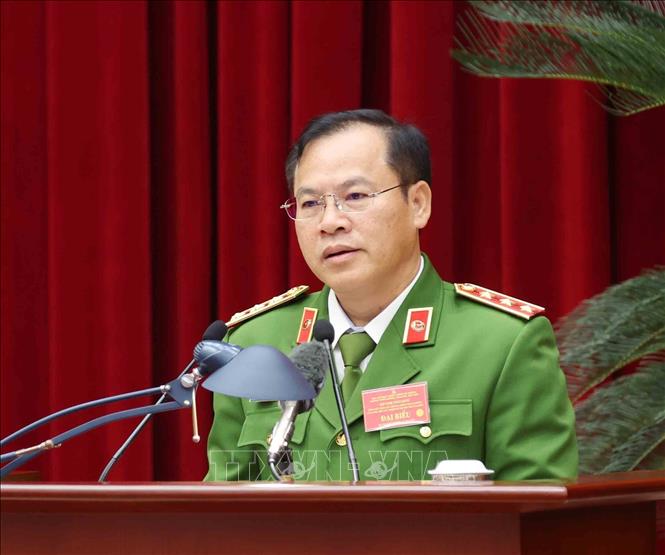 Thượng tướng Nguyễn Văn Long, Thứ trưởng Bộ Công an trình bày tham luận tại hội nghị. Ảnh: Phương Hoa – TTXVN