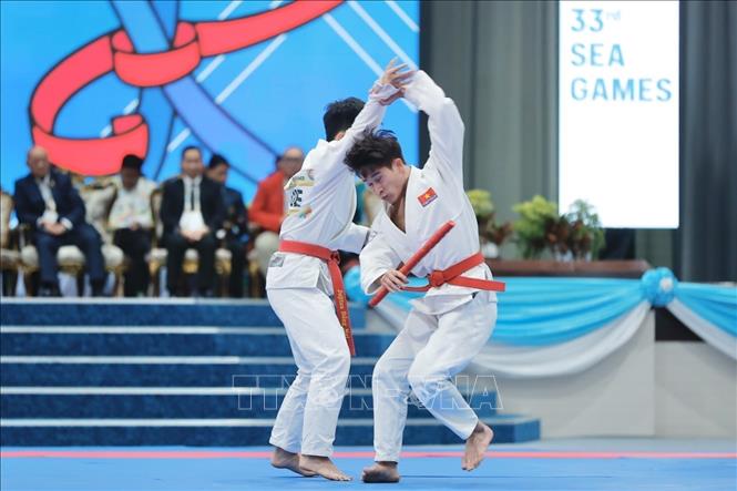 Phần thi nội dung biểu diễn của hai VĐV Việt Nam Trần Hữu Tuấn và Nguyễn Thanh Trà. Ảnh: Minh Quyết - PV TTXVN tại Thái Lan
