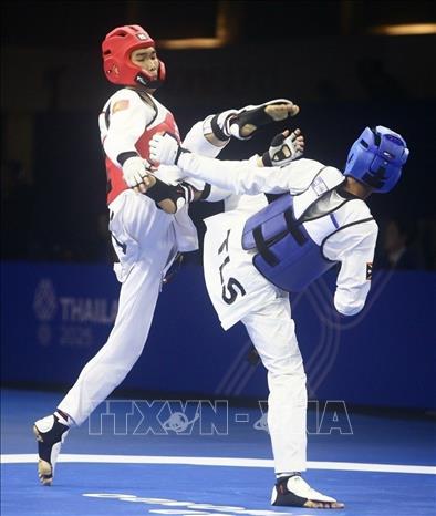 VĐV Nguyễn Hồng Trọng giành chiến thắng trước Da Costa D.C của Timor Leste, giành quyền vào bán kết hạng dưới 54kg. Ảnh: TTXVN phát
