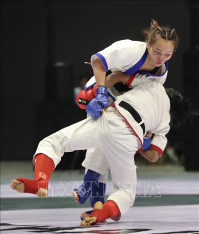 Võ sĩ Dương Thị Thanh Bình giành HCB MMA hạng 54kg nữ tại SEA Games 33. Ảnh: TTXVN phát