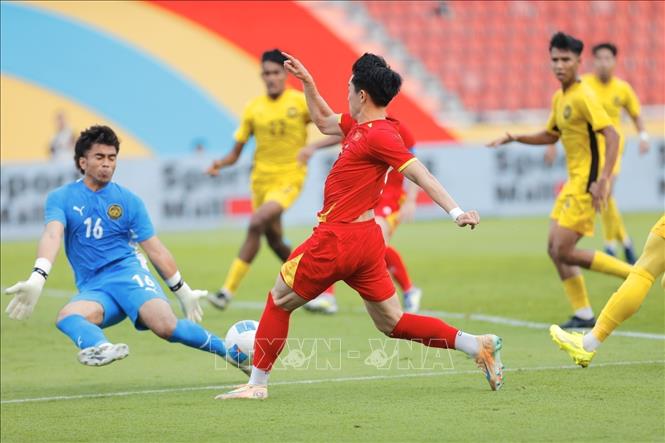 Pha dứt điểm nguy hiểm của Đình Bắc. Ảnh: Minh Quyết – PV TTXVN tại Thái Lan