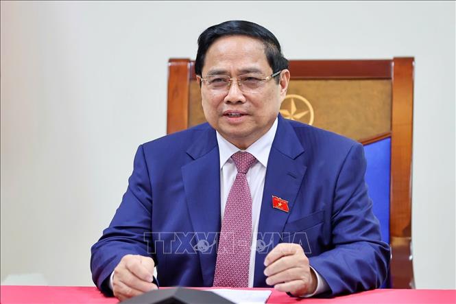 Thủ tướng Phạm Minh Chính điện đàm với Tổng giám đốc Tập đoàn Năng lượng Nguyên tử Quốc gia Liên bang Nga (Rosatom) Alexey Likhachev. Ảnh: Dương Giang-TTXVN 