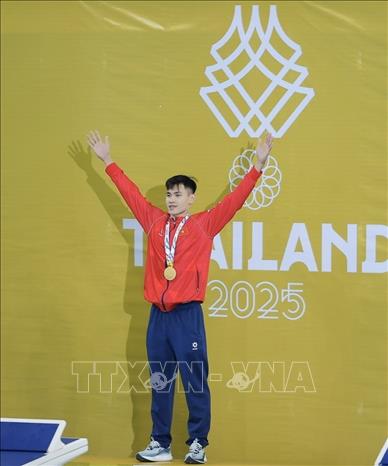 Phạm Thanh Bảo giành HCV nội dung 100m ếch nam. Ảnh: Minh Quyết - PV TTXVN tại Thái Lan