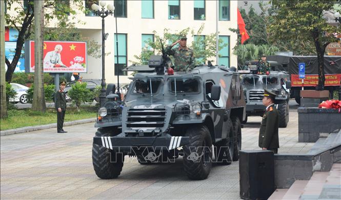 Lực lượng Công an diễu hành tại lễ ra quân. Ảnh: Văn Dũng - TTXVN