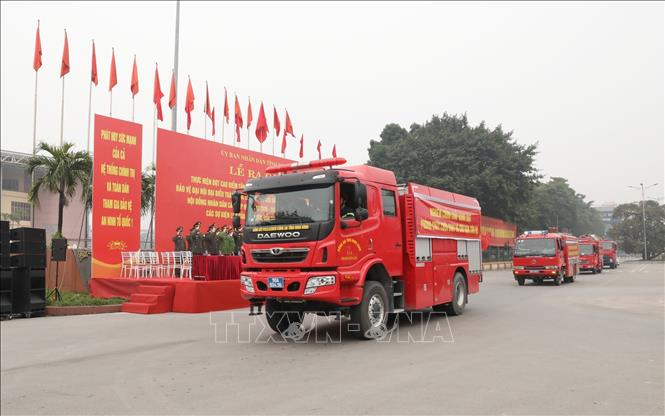 Hoạt động diễu hành, biểu dương lực lượng tại lễ ra quân. Ảnh: Đức Phương - TTXVN