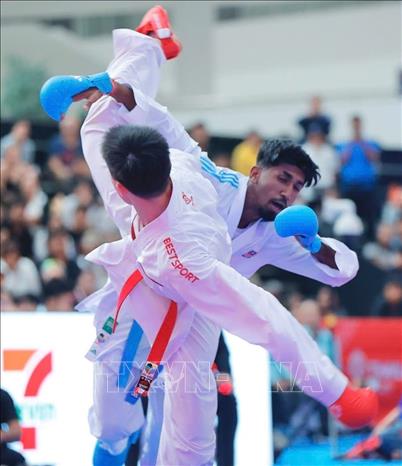 Võ sĩ Chu Văn Đức để thua đối thủ đến từ Malaysia ở chung kết nội dung Kumite dưới 55kg nam. Ảnh: Minh Quyết - PV TTXVN tại Thái Lan