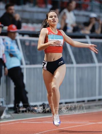 Nguyễn Thị Ngọc xuất sắc giành huy chương Vàng nội dung chạy 400m nữ với thành tích 52,74 giây. Ảnh: Minh Quyết - PV TTXVN tại Thái Lan