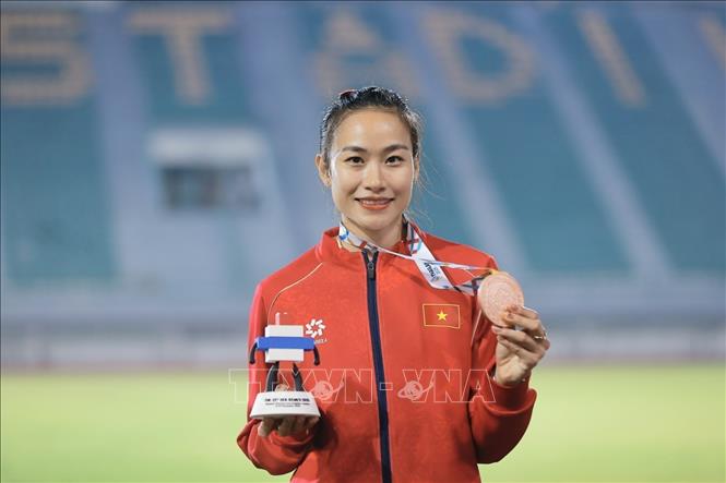 VĐV Huỳnh Thị Mỹ Tiên giành HCĐ nội dung chạy 100m rào nữ. Ảnh: Minh Quyết - PV TTXVN tại Thái Lan