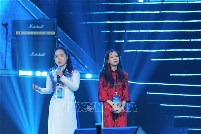 Đại diện đội Agrilink Agricultural Co., Ltd tham gia thuyết trình trong cuộc thi. Ảnh: Hoàng Hiếu - TTXVN