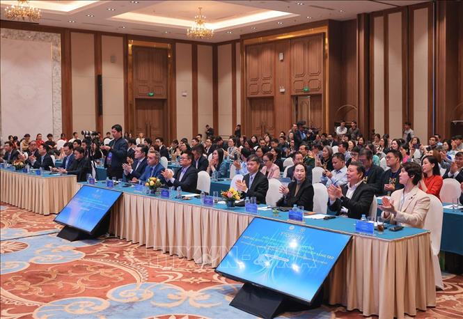 Các đại biểu trong nước và quốc tế tham dự diễn đàn. Ảnh: Hoàng Hiếu - TTXVN