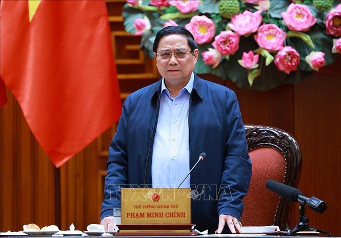 Thủ tướng Phạm Minh Chính chủ trì cuộc họp với lãnh đạo tỉnh Quảng Trị về xây dựng nhà ở cho các gia đình bị thiệt hại do thiên tai tại Quảng Trị. Ảnh: Dương Giang-TTXVN
