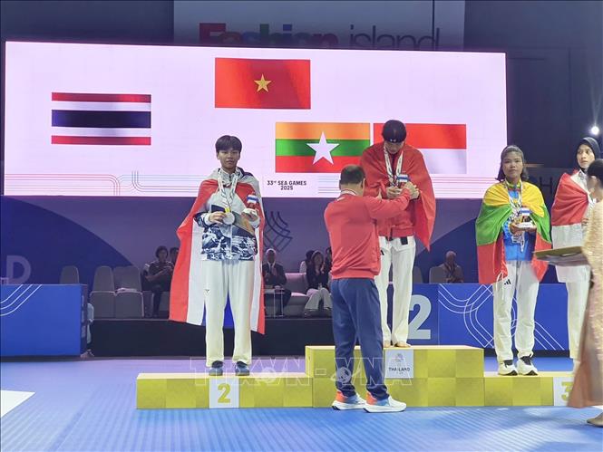 VĐV Trần Thị Ánh Tuyết giành HCV môn Taekwondo ở hạng cân 57 kg nữ. Ảnh: TTXVN phát