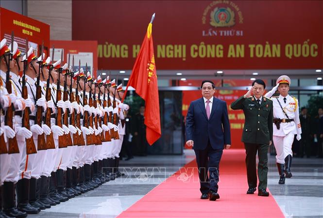Thủ tướng Phạm Minh Chính đến dự Hội nghị Công an toàn quốc lần thứ 81. Ảnh: Dương Giang-TTXVN

