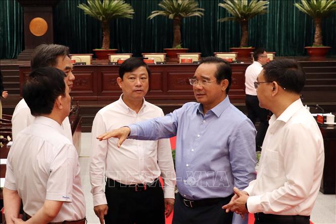 Các đại biểu trao đổi tại Hội nghị. Ảnh: Tiến Lực - TTXVN