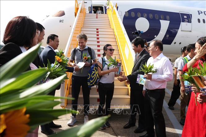 Lễ đón khách du lịch quốc tế thứ 20 triệu đến Việt Nam. Ảnh: Trần Công Đạt – TTXVN