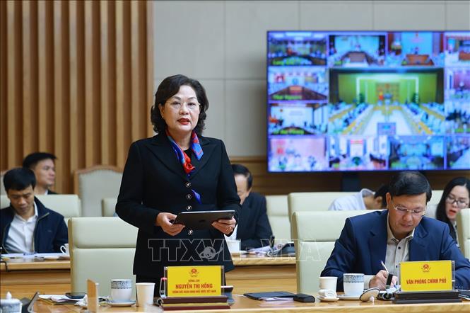 Thống đốc Ngân hàng Nhà nước Nguyễn Thị Hồng phát biểu. Ảnh: Dương Giang-TTXVN
