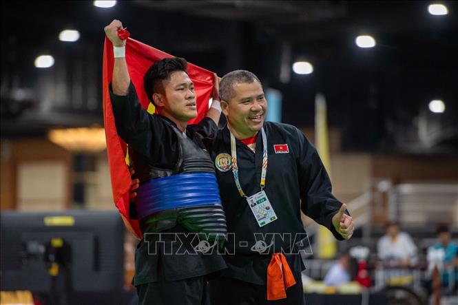 VĐV Nguyễn Tấn Sang đã xuất sắc giành HCV môn Pencak Silat nội dung đối kháng (75 - 80kg nam). Ảnh: TTXVN phát