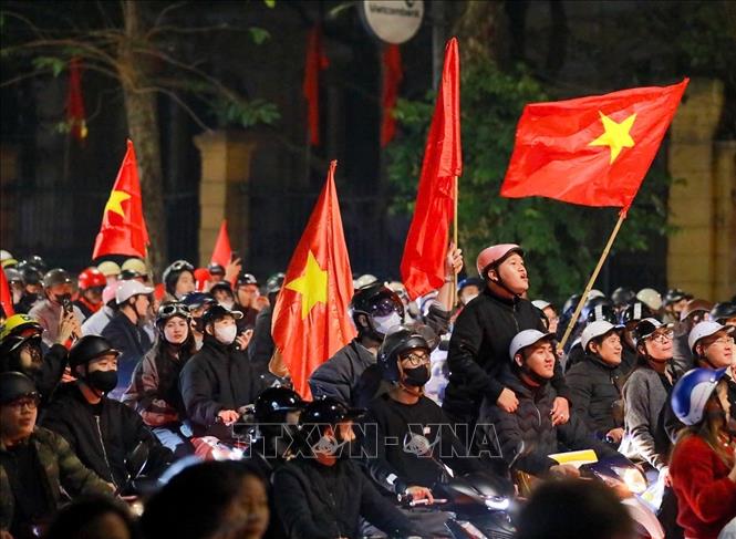 Vietnamese fans in Hanoi flock to the street to celebrate the win. VNA Photo 