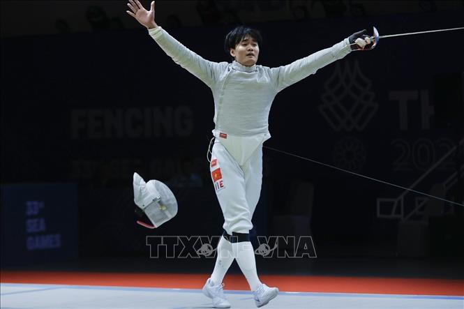 VĐV Nguyễn Văn Quyết ăn mừng chiến thắng khi đấu trận quyết định trong trận chung kết gặp Malaysia. Ảnh: Minh Quyết - PV TTXVN tại Thái Lan