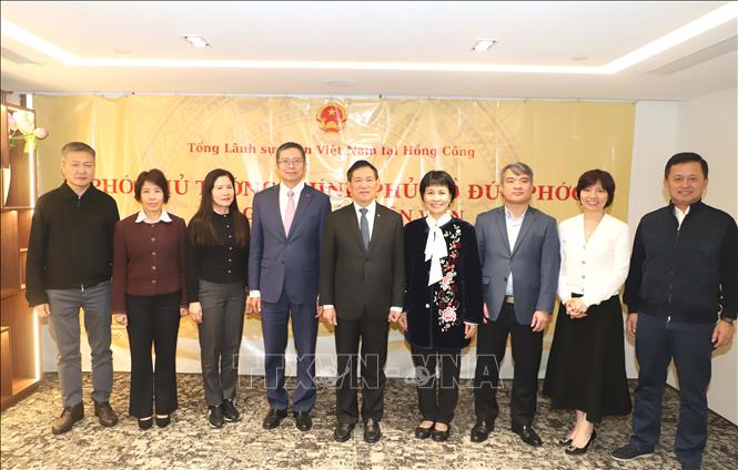 Phó Thủ tướng Hồ Đức Phớc cùng đoàn công tác. Ảnh: Xuân Vịnh - PV TTXVN tại Hong Kong

