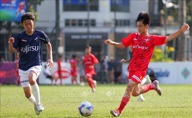 Trận đấu All Star giữa đội tuyển chọn U13 Nhật Bản – Singapore và U13 Việt Nam. Ảnh: Huyền Trang - TTXVN
