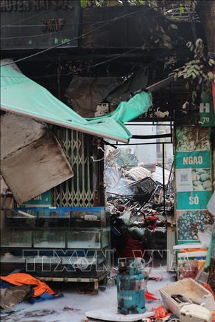 Hiện trường tan hoang sau vụ cháy chợ Xanh Định Công, phường Phương Liệt, Hà Nội. Ảnh: Lê Đông - TTXVN
