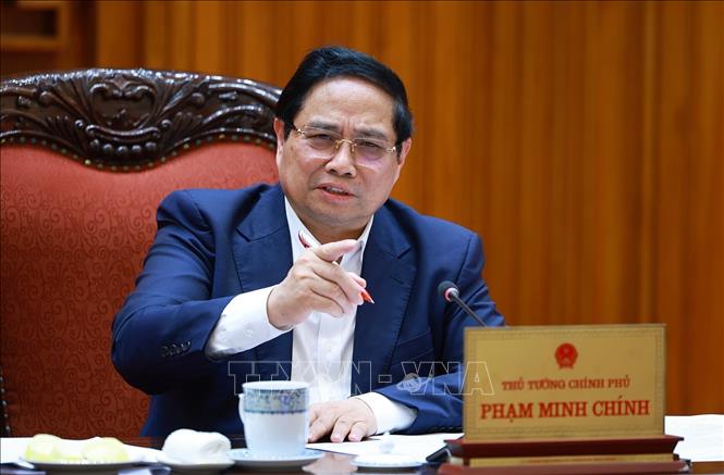 Thủ tướng Phạm Minh Chính chủ trì họp Thường trực Chính phủ về các dự án đường sắt. Ảnh: Dương Giang-TTXVN 
