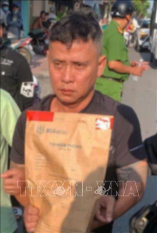  Nguyễn Xuân Hòa khi bị Công an bắt giữ. Ảnh: TTXVN phát