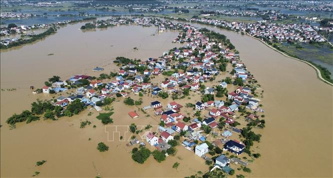Xóm 1, thôn Đa Hội, xã Hợp Thịnh, Bắc Ninh chìm trong biển nước. Ảnh: Trần Việt - TTXVN 