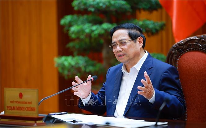 Prime Minister Pham Minh Chinh chairs the meeting. VNA Photo: Dương Giang