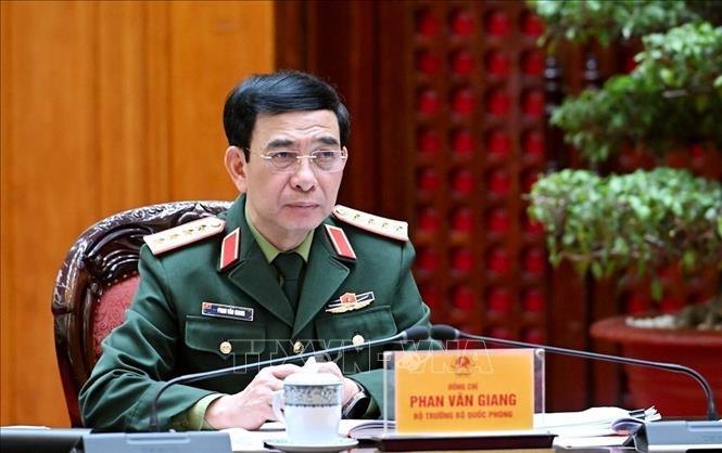 Minister of National Defence General Phan Van Giang attends the meeting. VNA Photo: Dương Giang