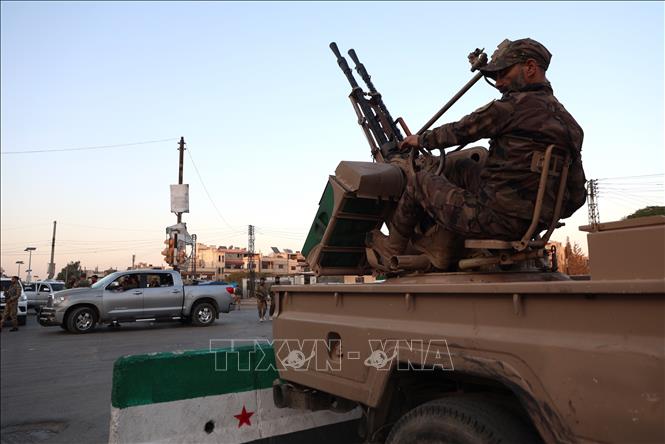 Lực lượng an ninh Syria tuần tra tại thành phố Homs. Ảnh: THX/TTXVN