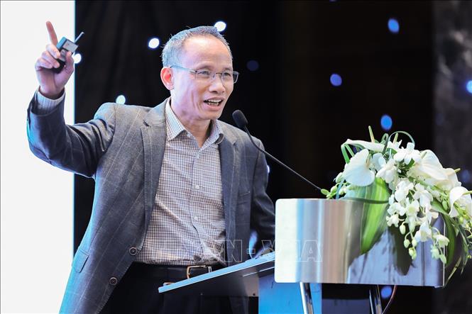 TS Cấn Văn Lực, Chuyên gia kinh tế trưởng ngân hàng Đầu tư và Phát triển Việt Nam (BIDV), Thành viên hội đồng tư vấn Chính sách của Thủ tướng Chính phủ chia sẻ tại Diễn đàn. Ảnh: Lê Đông - TTXVN