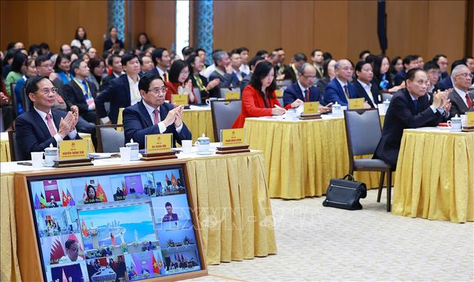 Thủ tướng Phạm Minh Chính đến dự Hội nghị toàn quốc tổng kết công tác đối với người Việt Nam ở nước ngoài. Ảnh: Dương Giang-TTXVN