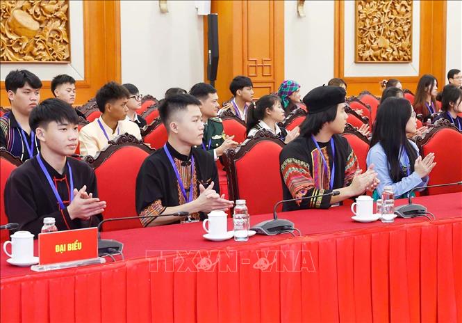Học sinh, sinh viên, thanh niên dân tộc thiểu số xuất sắc, tiêu biểu tại buổi gặp mặt. Ảnh: Thống Nhất – TTXVN