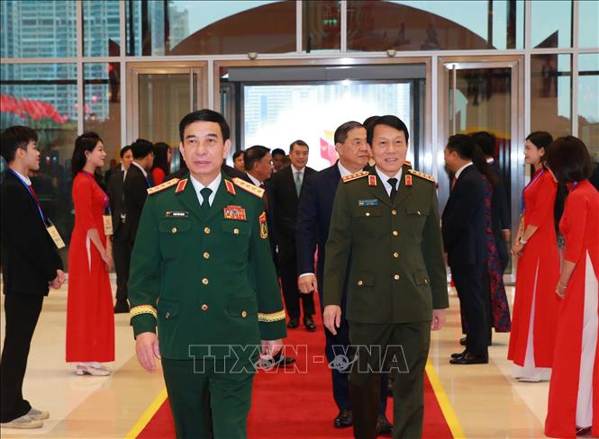 Đại tướng Phan Văn Giang, Bộ trưởng Bộ Quốc phòng và Đại tướng Lương Tam Quang, Bộ trưởng Bộ Công an đến dự đại hội. Ảnh: Trọng Đức - TTXVN