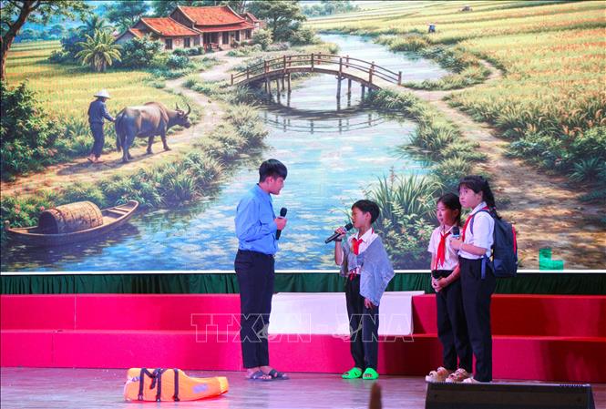 Phần thi tiểu phẩm của đội thi số 2 (xã Lai Hòa và phường Vĩnh Phước). Ảnh: Nguyễn Hằng – TTXVN