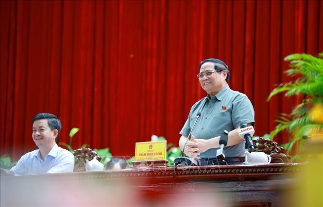 Thủ tướng Phạm Minh Chính tiếp xúc cử tri thành phố Cần Thơ chuyên đề về y tế và giáo dục. Ảnh: Dương Giang-TTXVN 

