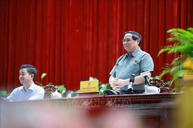 Thủ tướng Phạm Minh Chính tiếp xúc cử tri thành phố Cần Thơ chuyên đề về y tế và giáo dục. Ảnh: Dương Giang-TTXVN 
